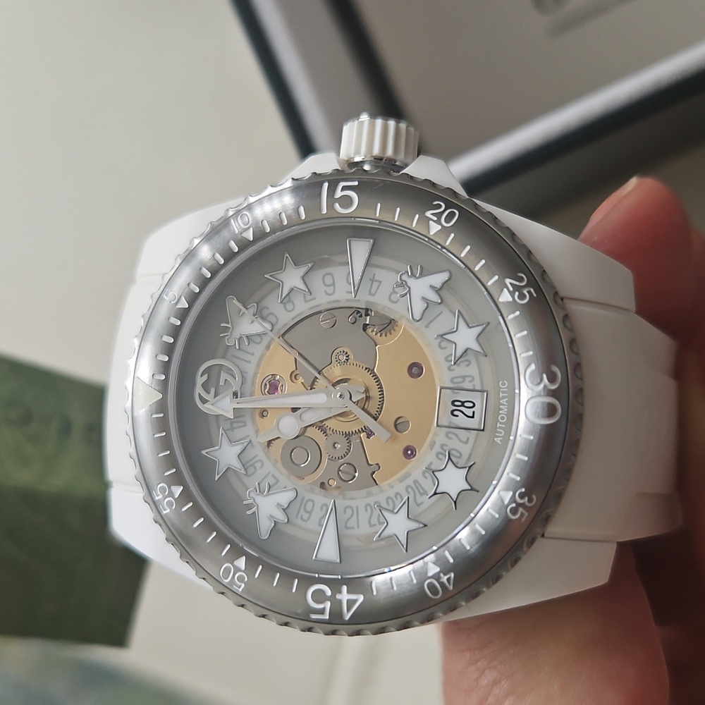 Gucci Cream and Gray Star Accent Watch